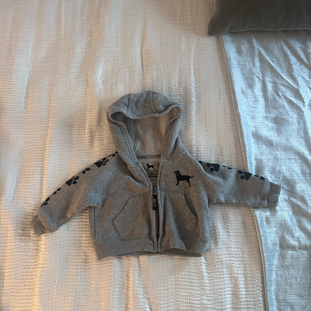 The Black Dog Gray Hoodie with Paw Print Sleeves